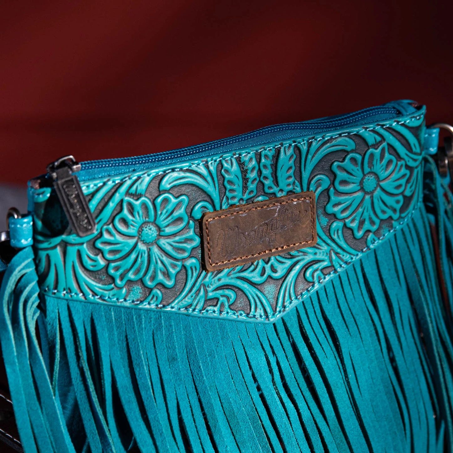 Wrangler Vintage Floral Tooled Collection Fringe Crossbody or Wristlet - Turquoise