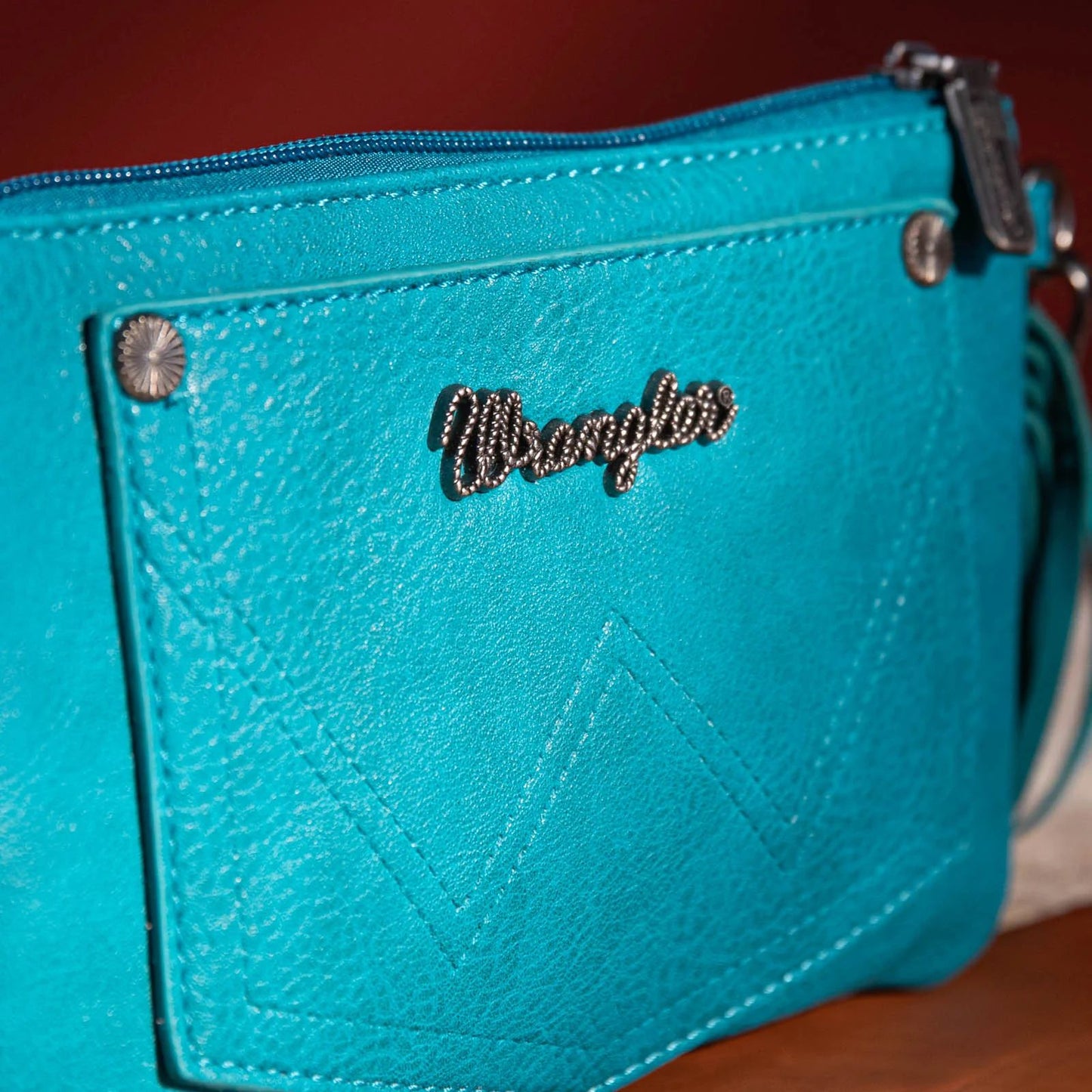 Wrangler Vintage Floral Tooled Collection Fringe Crossbody or Wristlet - Turquoise